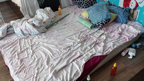 Sensual massage of a sexy couple with oil on the body. Foreplay in the bedroom with an amateur couple.