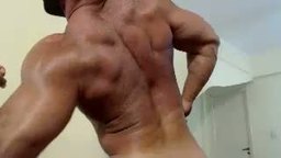 Hot Muscle Man Flexes and Strips