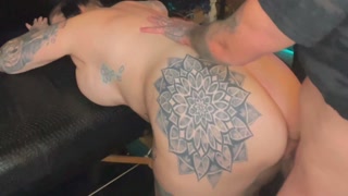 Thick big titty tattooed  goth milf gets fucked till she squirts by her tattoo artist