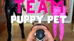 TWO EBONY DOMS IN LATEX TAG TEAM THEIR PUPPY PET'S ASS