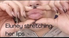 Eluney stretching her lips