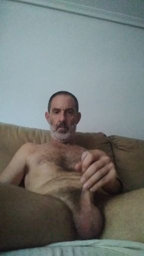 Masturbating