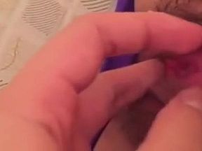 Cute Chinese girl shows her hairy pussy and fingering