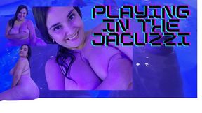 Playing and masturbating in the jacuzzi
