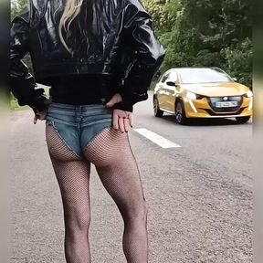 walk in town and roadside solicitation of a sissy in a whore&#039;s outfit, vinyl top and mini denim shorts