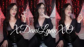 Smoking Wearing Sheer Dress and Corset