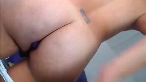 Seductive transgender with busty figure teasing on webcam