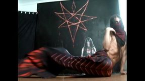 crossdresser with long hair dressed as a mermaid and doing anal fisting