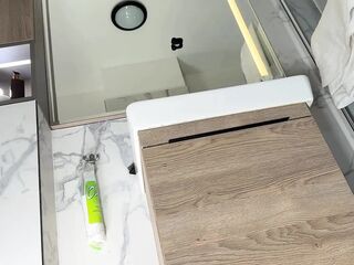 Large breasts large butt sexy hawt gal in the bath with the short pink petticoat shows her braless breasts and lengthy legs