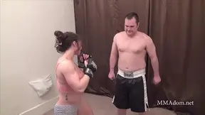 Muscular Domme Flexes Power Over Submissive Male