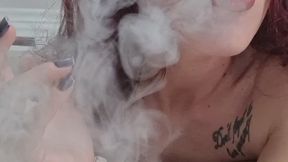 Naughty woman with bushy pussy hair smokes while talking dirty with whipped cream!