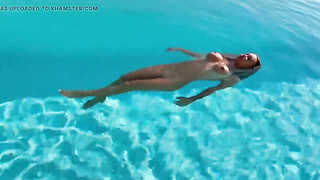 Fantastic Monika Fox Swims Nude in Pool in Wondrous Place!