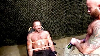 Hot military guy Dirk Caber loves being tied up to a table and tormented