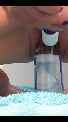 Squirting Over a Bottle of Water