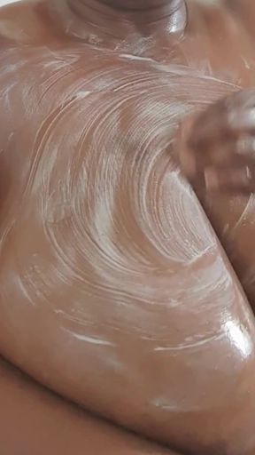 Ebony washing her big saggy tits in the shower and showing off her plus size curves