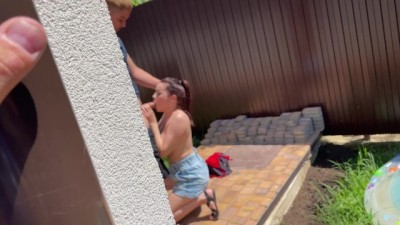 Busty girl sucks boyfriend in my backyard!