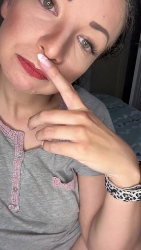 Woman pointing finger at camera