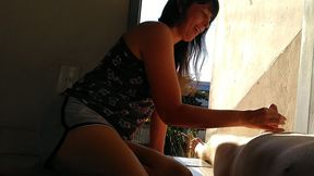 clothed female handjob naked male. front door is opened.