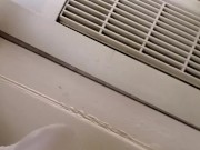 Pissing a full bladder into the window unit