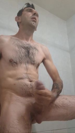Straight guy with a huge cock jerks off in the shower until he gets all the milk out.   Clip 2