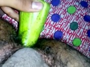 Inserting huge cucumber in asshole