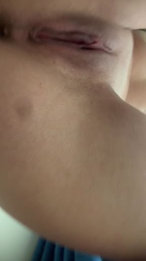 Close-up of a person's face with a mole
