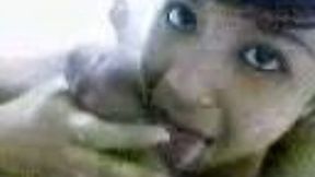 Cute and sexy brunette Malay girlfriend blows my dick