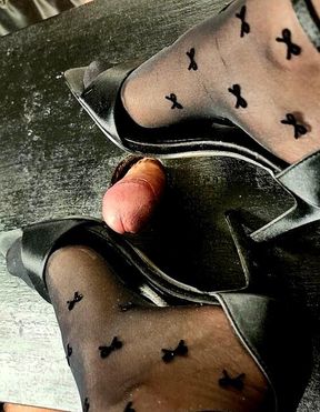 Elegant sandals stick out like a pathetic penis.