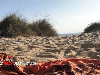 Masturbating a stranger on the beach