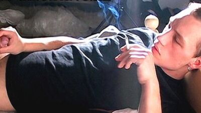 BoysSmoking: Aroused Jony drains his uncut pricks sweet juice while smoking