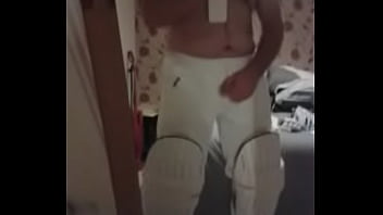 Cricketer strokes his bat