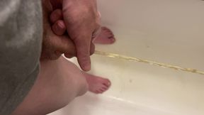 Amateur Boy Pissing, with Close-up and Good Quality Slow Motion of the Load of Pee Coming Out of the Pee-hole (urethra)