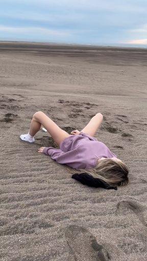 Public babe caught fingered at beach