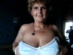 Voluptuous granny puts her big natural breasts on display