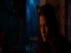 Angelina Jolie first pulling her shirt over her head to