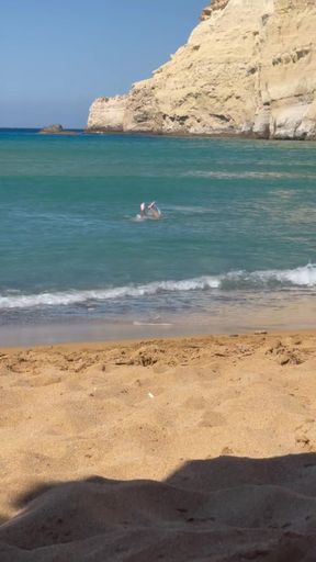 Nudist exhibitionist shows off at the beach