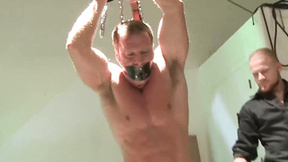 Bondage hunk tied up & shaved all over his tummy