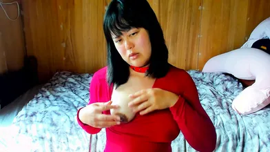 A big tittied Japanese woman jerks-off its nipples bymeans its underwear.