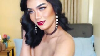 Asian trans fucks flashlight on webcam