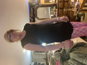 Charlene is dancing.  Gurl dancing dressed for the first time on camera
