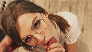 Cute college girl in round glasses got a facial and hair cumshot