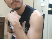 Handsome man flexing and showing off flaccid long cock