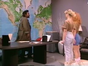 A blonde and a redhead show their blowjob skills in retro video