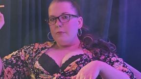 By request, wearing a flowered blouse smoking a cork filter Marlboro menthol full flavor 100