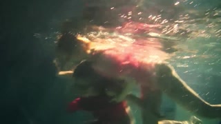 Lesbians and solo girls make out underwater