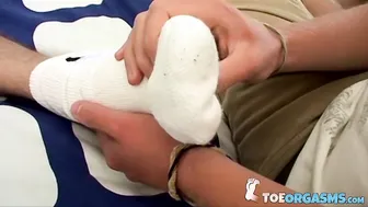 Young twink Jordan Ashton licks his own cum off his foot