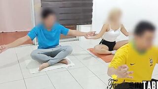 The blonde yoga beginner is interrupted by a participant who