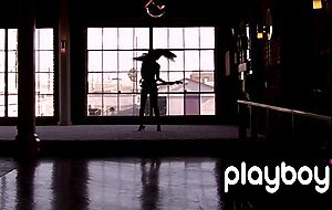 Exotic asian beauty Grace Kim stripping during playing on a guitar
