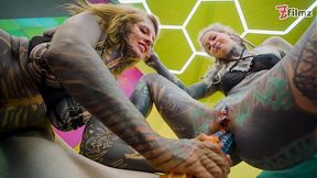 Heavy Inked Lesbians Ride Big Toys in On all fours Anal Session