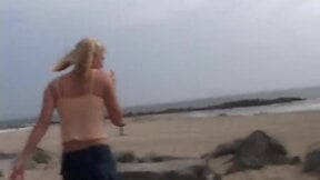 Petite teen masturbating on the beach